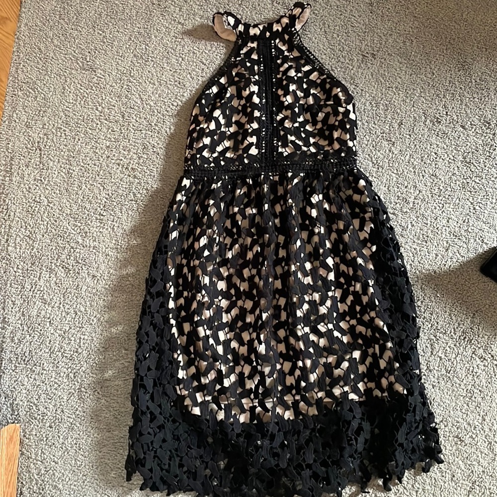 Beige dress with black Lacey overlay